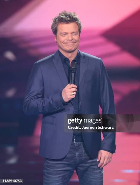 Oliver Geissen looks on during the second event show of the tv competition "Deutschland sucht den Superstar" at Coloneum on April 13, 2019 in...