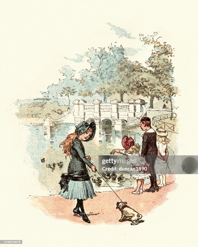 Victorian girl walking her dog in the park, west London