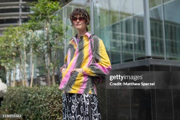 Chloe Hill is seen wearing tie dye jacket, black/white swirl pattern skirt during the Amazon Fashion Week TOKYO 2019 A/W on March 19, 2019 in Tokyo,...