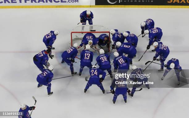 French players gathers around the goal before the International Friendly match between France and Russia at Aren'ice on April 13, 2019 in Cergy,...