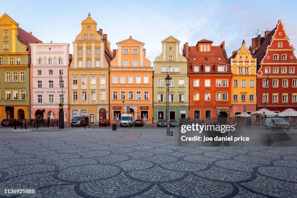 row of colourful houses, wroclaw, poland - wroclaw stock-fotos und bilder