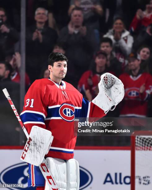 Goaltender Carey Price of the Montreal Canadiens reacts as he receives a standing ovation for setting a franchise record with 315 victories as a...