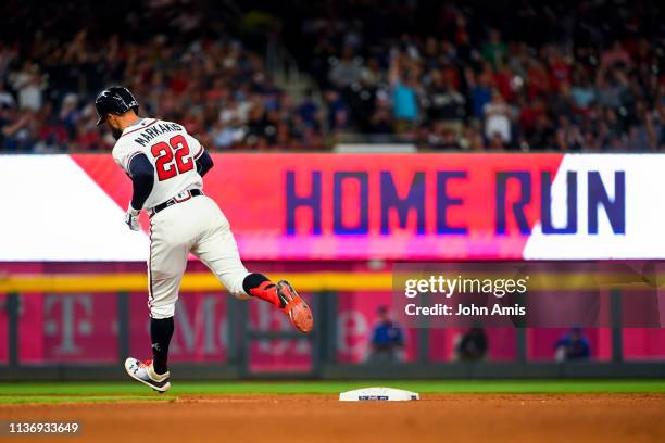 Nick Markakis of the Atlanta Braves runs bases during a home run against the New York Mets in the fourth inning at SunTrust Park on April 13, 2019 in...