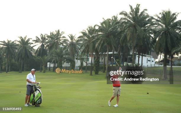 Thomas Bjorn of Denmark in action during the Pro Am event prior to the start of the Maybank Championship at the Saujana Golf & Country Club, Palm...