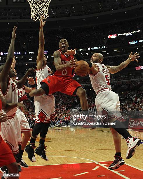 Jeff Teague of the Atlanta Hawks drives to the basket between Loul Deng, Joakim Noah, Derrick Rose and Carlos Boozer of the Chicago Bulls in Game Two...
