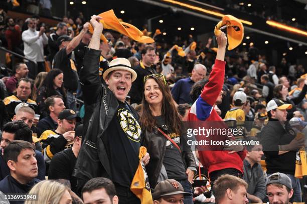 Boston Bruins fans wave their rally towel and celebrate the 4 to 1 win. During Game 2 in the First round of the Stanley Cup playoffs featuring the...
