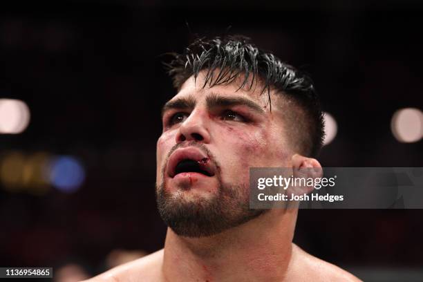 Kelvin Gastelum reacts after being defeated by Israel Adesanya by unanimous decision in their interim middleweight championship bout during the UFC...