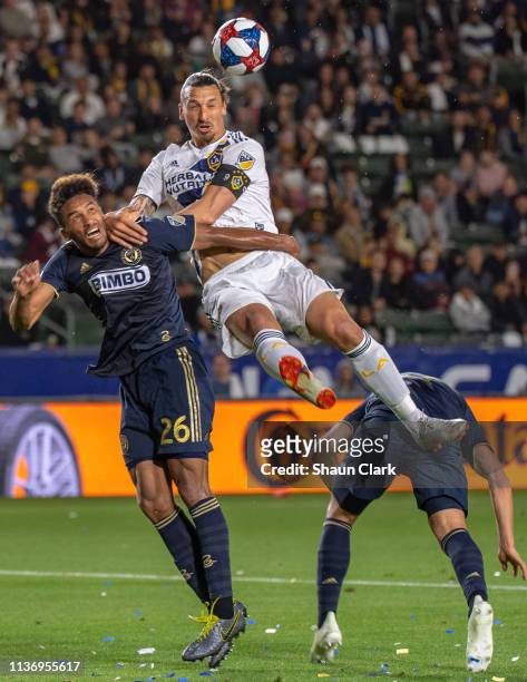Zlatan Ibrahimovic of Los Angeles Galaxy is fouled by Auston Trusty of Philadelphia Union as he tries to get on the end of a cross during the Los...