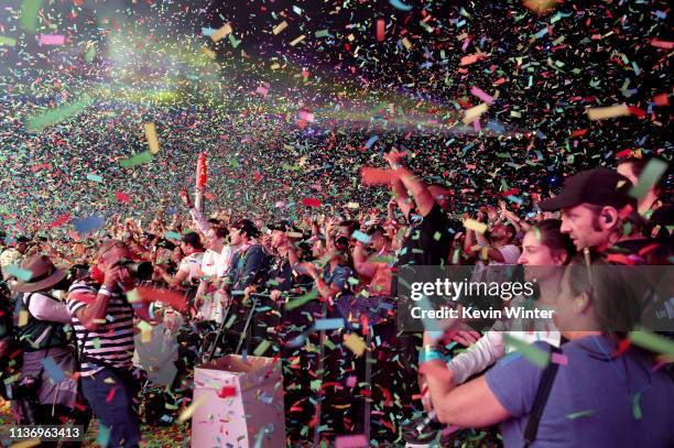Confetti is seen in the crowd at the Tame Impala performance at Coachella Stage during the 2019 Coachella Valley Music And Arts Festival on April 13,...