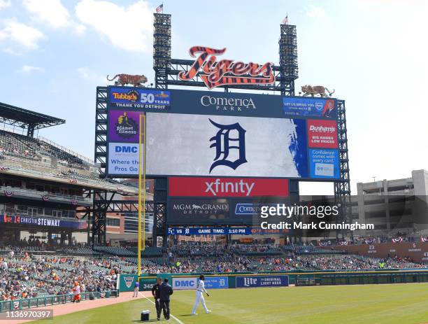 The scoreboard displays a Tigers D logo graphic prior to the Detroit Tigers game against the Kansas City Royals at Comerica Park on April 6, 2019 in...