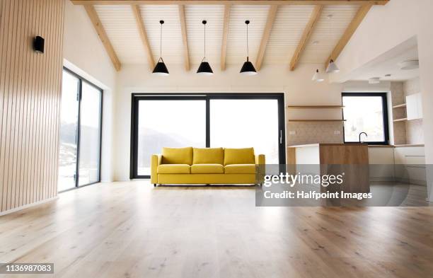 interior of a modern white empty kitchen and living room. - modern living room fotografías e imágenes de stock