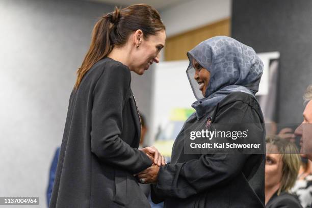 New Zealand Prime Minister Jacinda Ardern greets a first responder during a visit to the Justice and Emergency Services precinct on March 20, 2019 in...