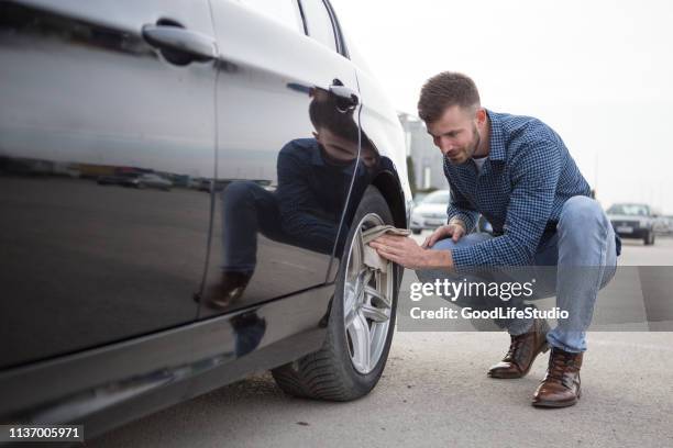 Man Cleaning Rims 62 Cleaning Rims Car Stock Photos, High-Res Pictures, and Images ...