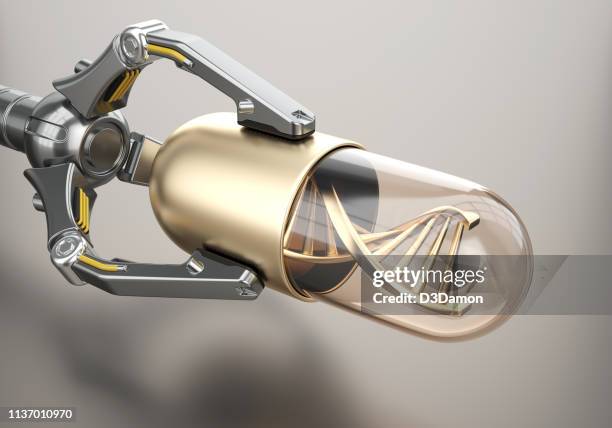 robotic arm holds golden pill with dna - tablet 3d stock pictures, royalty-free photos & images