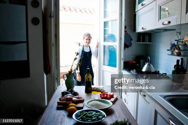 happy in the kitchen - cerdeña stock pictures, royalty-free photos & images