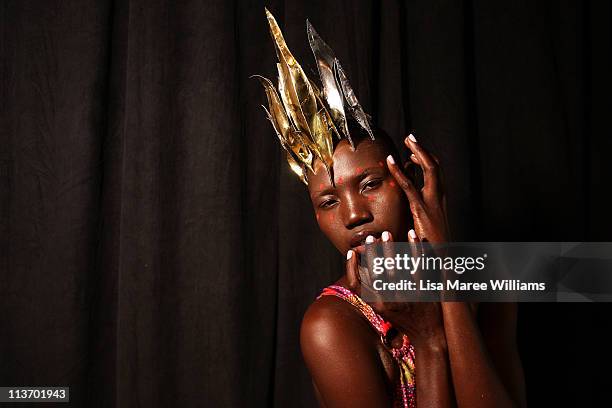 Model poses backstage ahead of the Lisa Blue show during Rosemount Australian Fashion Week Spring/Summer 2011/12 at Overseas Passenger Terminal on...