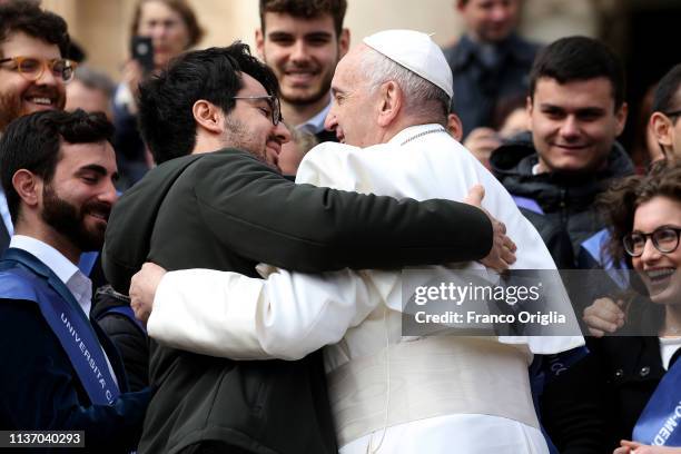 Pope Francis greets a student during his weekly audience n St. Peter's Square on March 20, 2019 in Vatican City, Vatican. During the general...