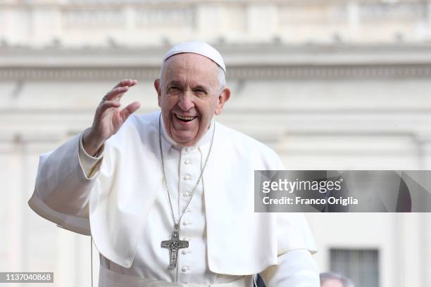 Pope Francis waves to the faithful as he arrives in St. Peter's Square for his weekly audience on March 20, 2019 in Vatican City, Vatican. During the...