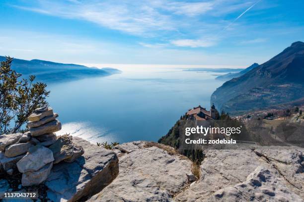 lake of garda landscape, trentino, italy - arco stock pictures, royalty-free photos & images