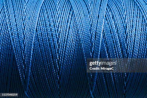 nylon string spool close-up shot - linhas texteis imagens e fotografias de stock