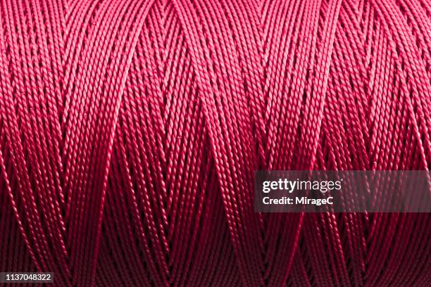 nylon string spool close-up shot - thread sewing item stock-fotos und bilder