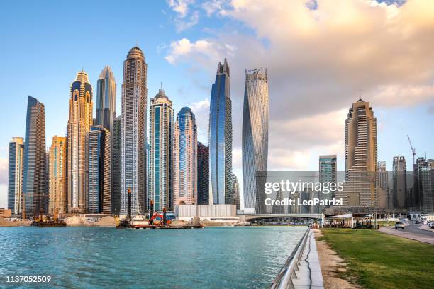 dubai marina business city skyline and architecture fast growth - dubai financial district stock pictures, royalty-free photos & images