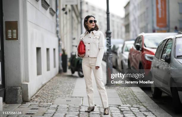 Frankie Miles wearing white Denim jacket wrangler, White Jeans Wrangler, Ripped turtleneck subdued, Snakeprint Boots sandro, Glam slam quilted...