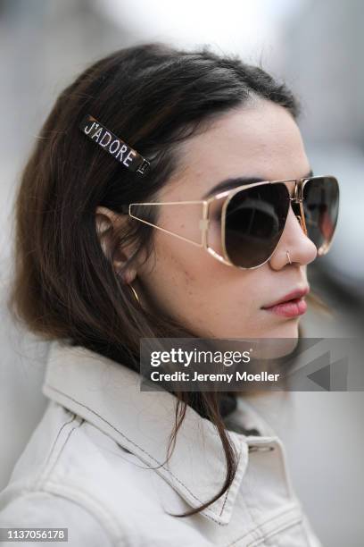Frankie Miles wearing white Denim jacket wrangler, pilote sunglasses givenchy, Hair clips Asos on March 19, 2019 in Berlin, Germany.