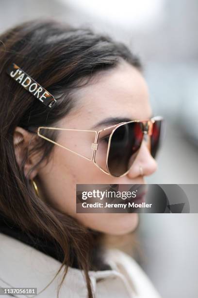 Frankie Miles wearing white Denim jacket wrangler, pilote sunglasses givenchy, Hair clips Asos on March 19, 2019 in Berlin, Germany.