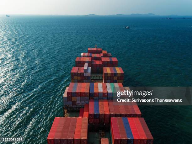 aerial view container ship on the sea delivery container for logistics, import export, shipping or transportation. - ship's bridge imagens e fotografias de stock