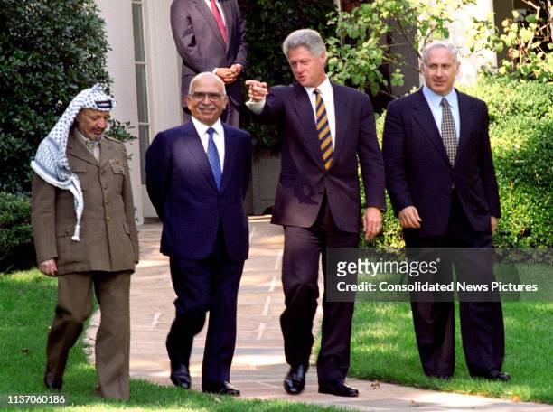 View of, from left, Palestinian Authority Chairman Yassir Arafat , King Hussein of Jordan , US President Bill Clinton, and Israeli Prime Minister...