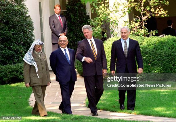 View of, from left, Palestinian Authority Chairman Yassir Arafat , King Hussein of Jordan , US President Bill Clinton, and Israeli Prime Minister...