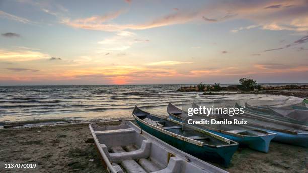 beautiful sunset on the pacific ocean by cartagena in colombia south america - pacific ocean stock pictures, royalty-free photos & images