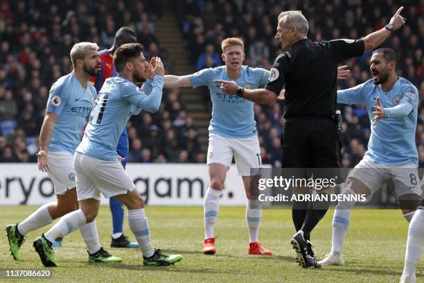 Manchester City's Argentinian striker Sergio Aguero , Manchester City's Spanish midfielder David Silva , Manchester City's Belgian midfielder Kevin...