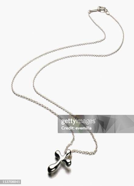 silver cross necklace cut out on white - chain stock pictures, royalty-free photos & images