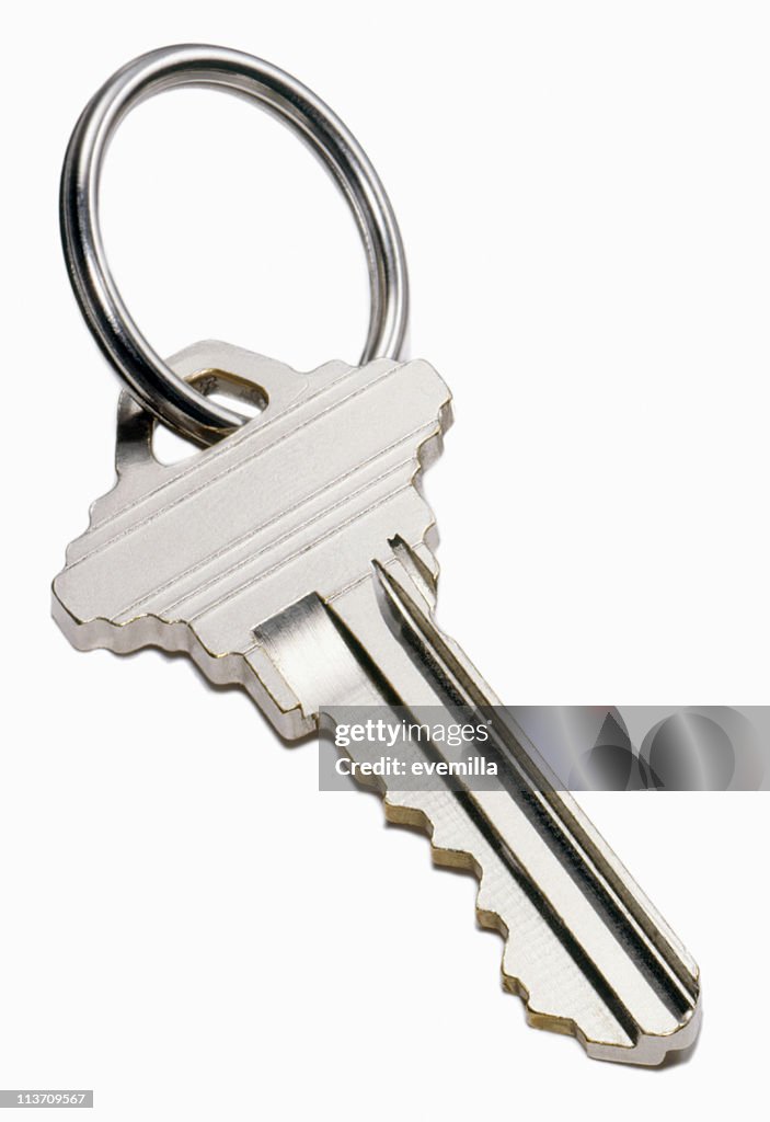 House key cut out on white