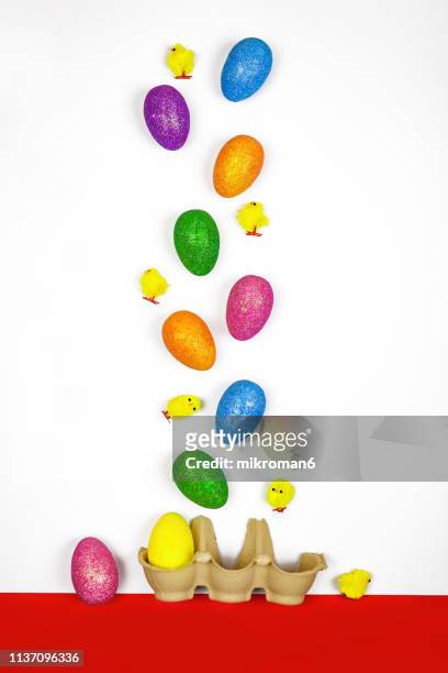 multi colored easter eggs against white background. - easter egg white background stock pictures, royalty-free photos & images