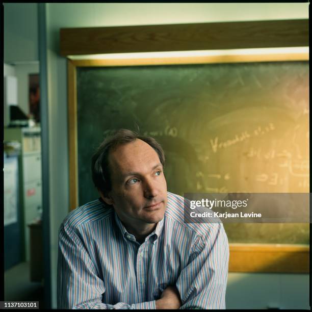 Portrait of British computer scientist and engineer Tim Berners-Lee as he poses in a classroom at the Massachusetts Institute of Technology ,...