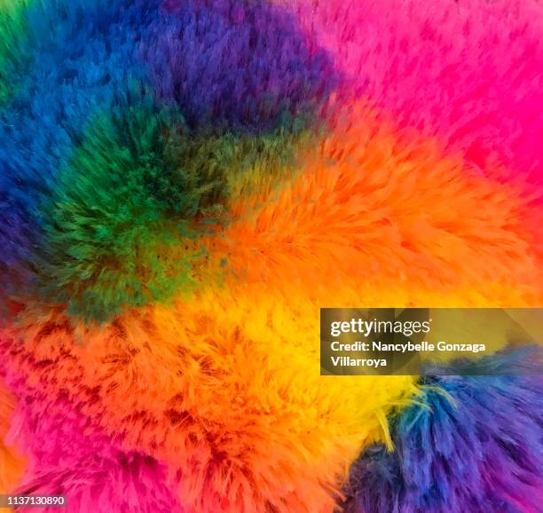 colourful textured fake fur fabric - fur stock pictures, royalty-free photos & images