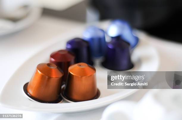 coffee capsules - coffee capsule stock pictures, royalty-free photos & images