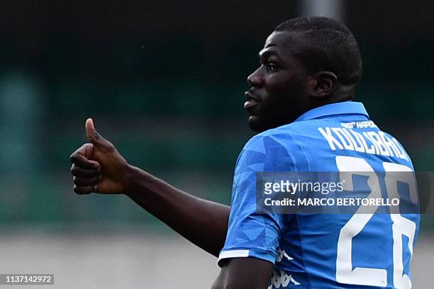 Napoli's Senegalese defender Kalidou Koulibaly celebrates after opening the scoring during the Italian Serie A football match Chievo Verona vs Napoli...