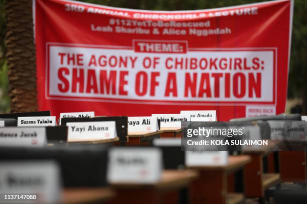 Names of the remaining Chibok schoolgirls are displayed with their desk on April 14 during the 5th Year Commemoration of the abduction of the 276...