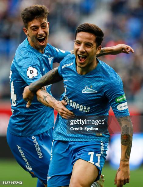 Sebastian Driussi of FC Zenit Saint Petersburg celebrates his goal with Emiliano Rigoni during the Russian Premier League match between FC Zenit...