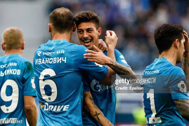 Emiliano Rigoni of FC Zenit Saint Petersburg celebrates his goal with teammates during the Russian Premier League match between FC Zenit Saint...