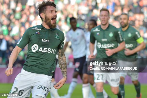 Saint-Etienne's French defender Mathieu Debuchy celebrates after scoring a goal during the French L1 football match between Saint-Etienne and...