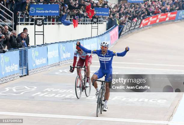 Philippe Gilbert of Belgium and Team Deceuninck Quick-Step wins in front of Nils Politt of Germany and Team Katusha Alpecin the 117th Paris-Roubaix...