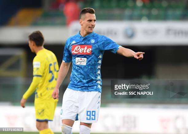 Arkadiusz Milik of Napoli celebrates after scoring the first goal during the Serie A match between Chievo Verona and SSC Napoli at Stadio...