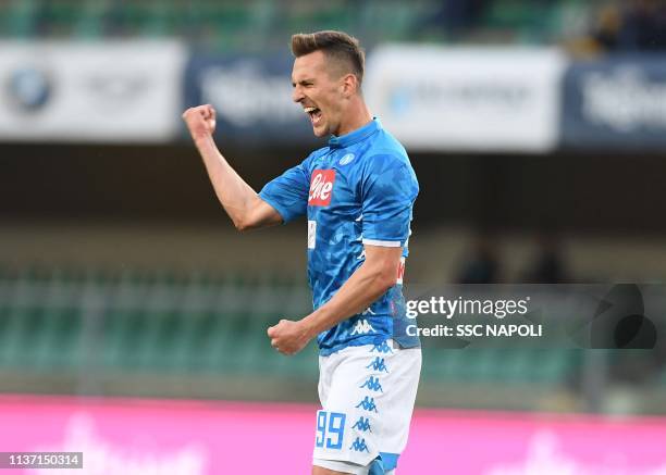 Arkadiusz Milik of Napoli celebrates after scoring the first goal during the Serie A match between Chievo Verona and SSC Napoli at Stadio...