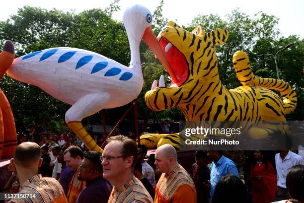 Bangladeshi ravellers attend a rally in celebration of the Bengali New Year or 'Pohela Boishakh' in Dhaka, Bangladesh, on April 14, 2019. The Bengali...