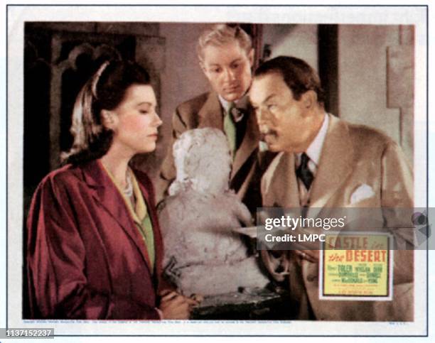 Castle In The Desert, lobbycard, from left: Arleen Whelan, Richard Derr, Sidney Toler on lobbycard, 1942.